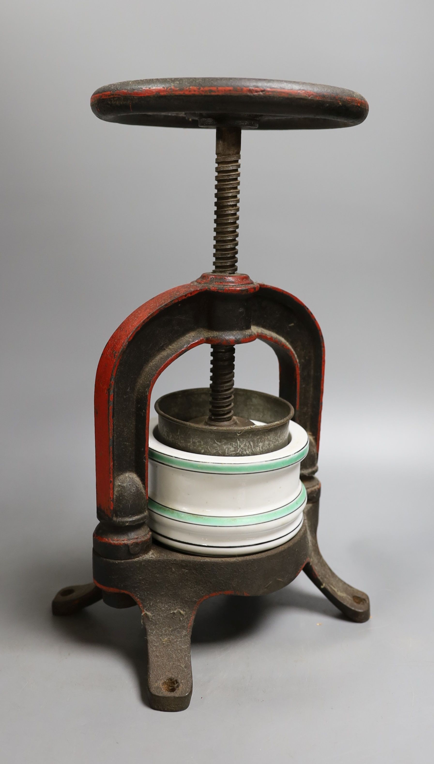 A French cast iron and ceramic pâté press, 39 cm high